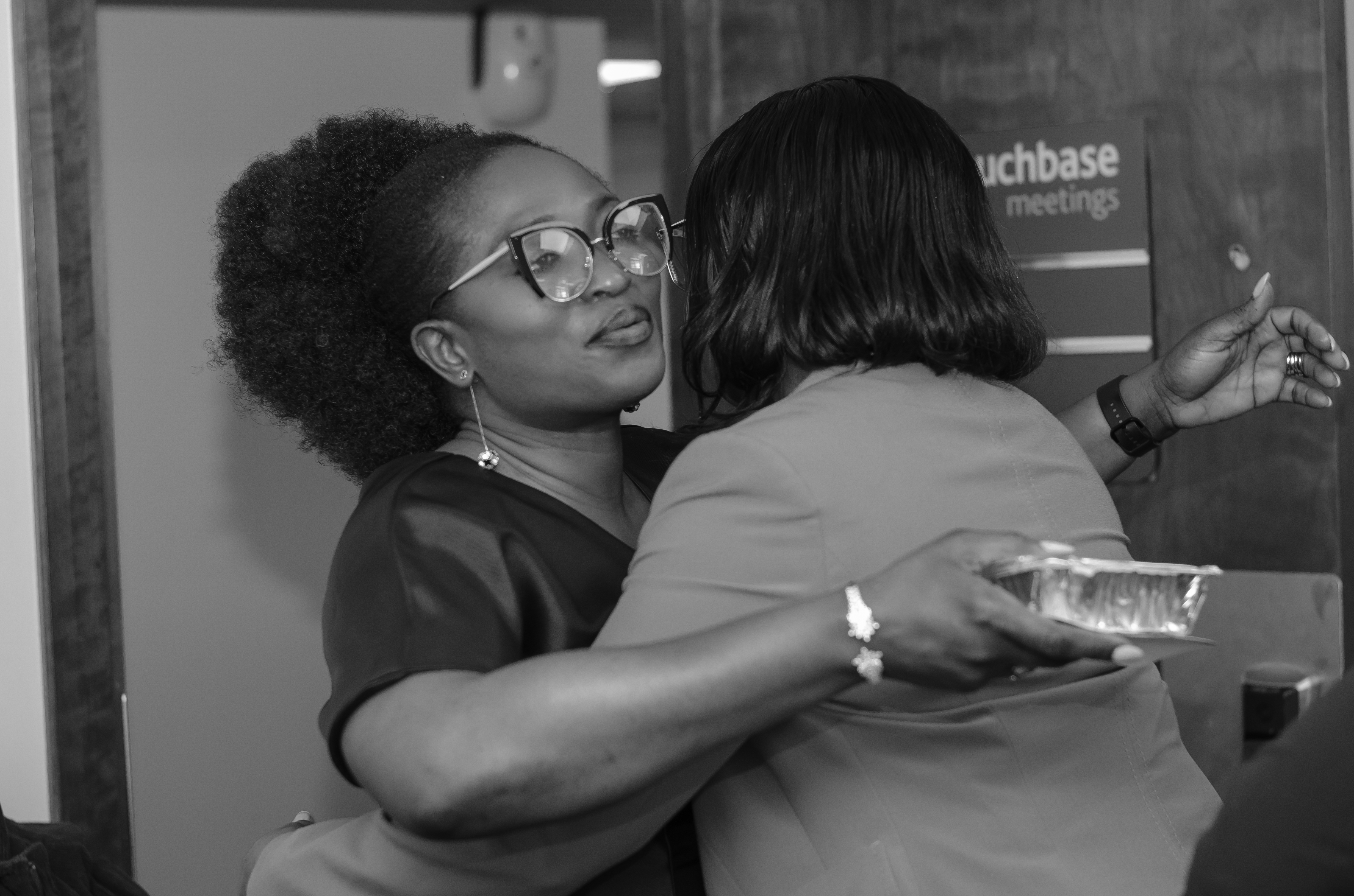 Bukola Jolugbo engaging with family and community members